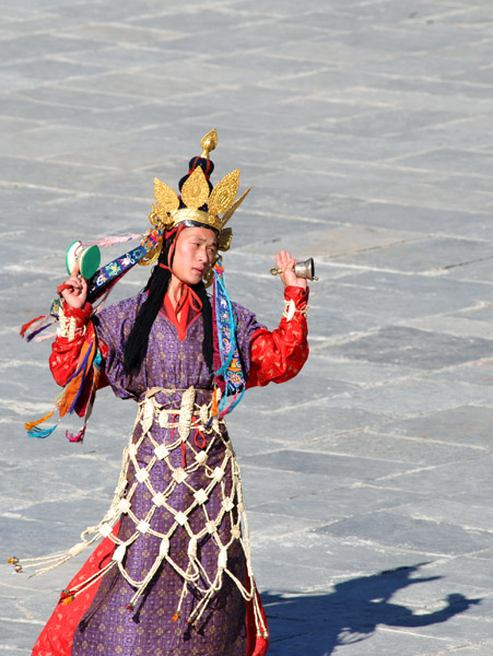 Dancer with a small bell, Tsechu Festival