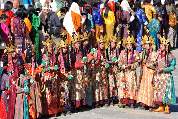 A group of dancers at the Tsechu Festival