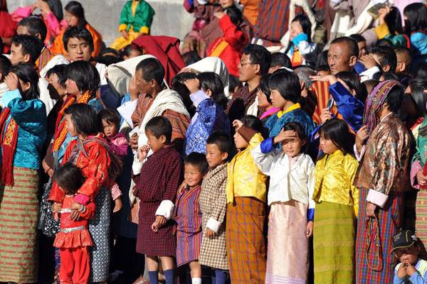 Spectators at the Tsechu Festival, young and old alike