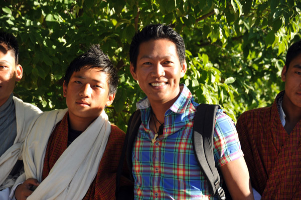 Dennis and a Bhutanese teenager after the Tsechu Festival
