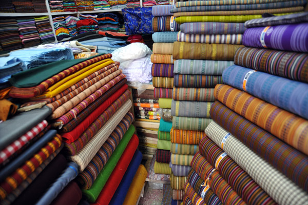 Many choices of colors and patterns for a Bhutanese gho