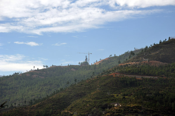 A giant Buddha under construction overlooking Thimphu