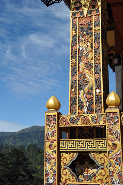 Painted and carved wooden pillars