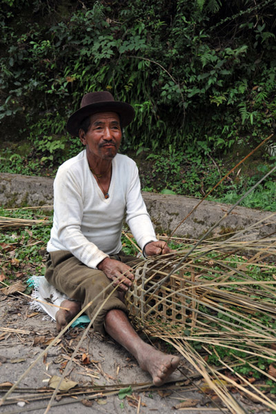 Man weaving a basket, Bhutan