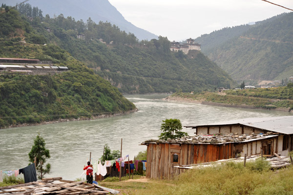 Simple wooden house along the river by Wangdue Phodrang