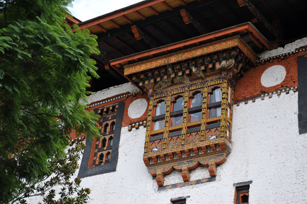 Traditional Bhutanese architecture uses similar details whether it's a fortress or a farm house