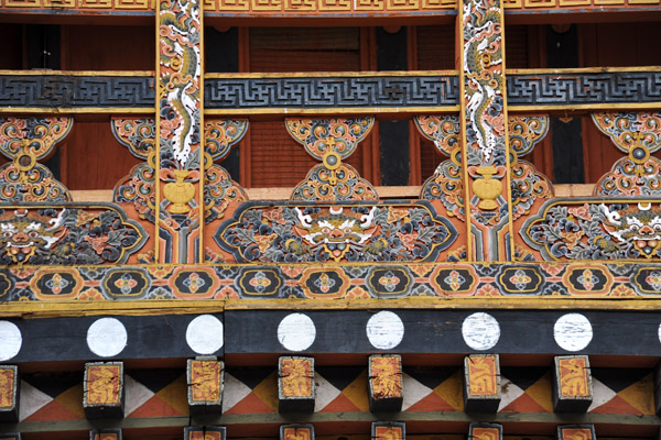 Beautifully painted carved bannister around the upper gallery, first courtyard, Punakha Dzong