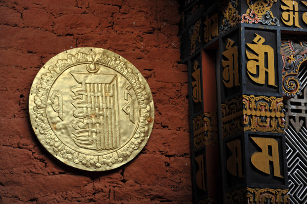 Hammered metal disk with the Kalachakra Tantra - the Tenfold Powerful One