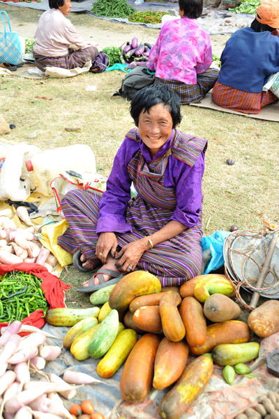 A smile from a market hawker in Khuruthang