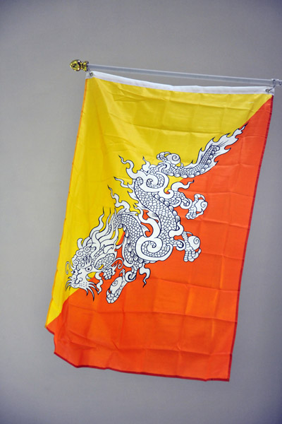 Flag of Bhutan - the Thunder Dragon with Buddhist orange and the royal yellow