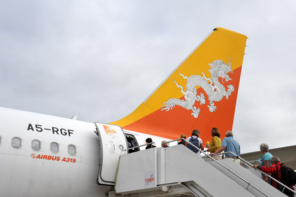 Boarding Drukair A319 (A5-RGF) at Paro Airport