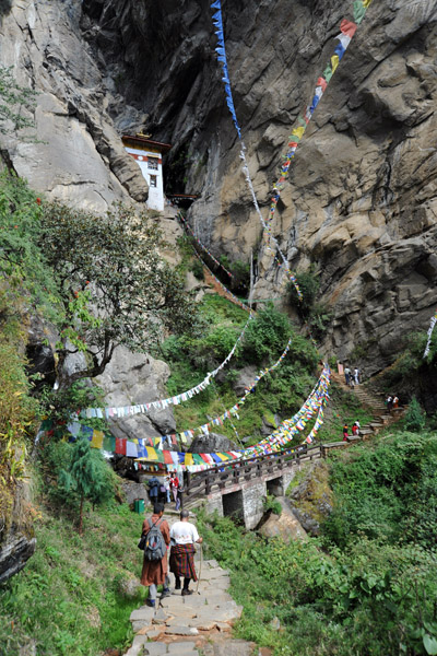 Crossing the final bridge beneath the Snow Lion Cave temple