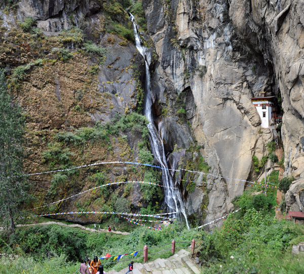 Panoramic view of the Tiger's Nest waterfall and Snow Leopard Cave