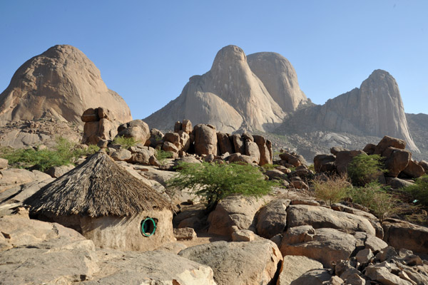 Villages among the rocks at the base of the Taka Mountains