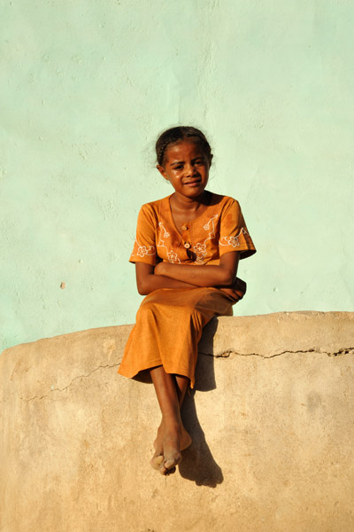 Girl sitting on a wall, Kassala