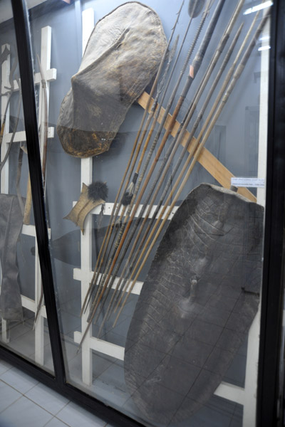 Shield of crocodile hide from the Shilluk Tribe and various spears