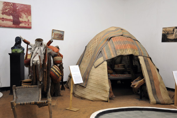 The dome-shaped tents of the Baggara are made of mats of palm fibre