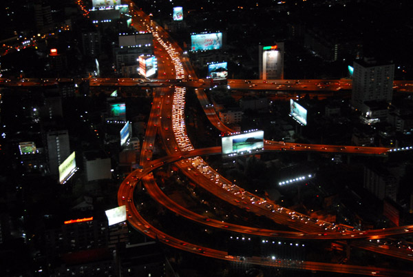 Heavy traffic on the Chalerm Maha Nakhon Expressway at night