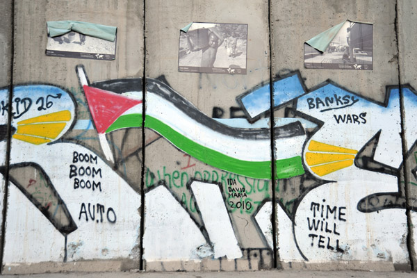 West Bank Separation Wall graffiti - Palestinian flag, Time will tell