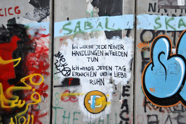 West Bank Wall graffiti - Ich werde jede meiner Handlunger in Frieden Tun. Ich werde jeden Tag erwachen und in Liebe ruhn