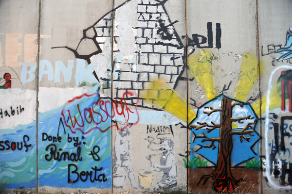 West Bank Separation Wall graffiti - Children and bricks signed by Rinal & Berta