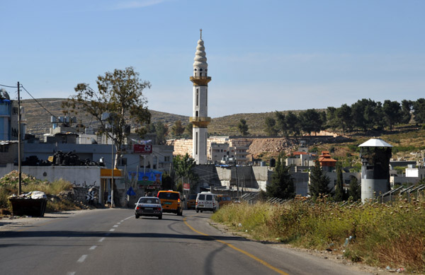 A minaret rising from the Palestinian town of Mu'askar al'Arub