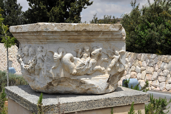 Marble pedestal decorated with cupids riding hybrid marine creatures, Beth Shean, 2nd C. AD