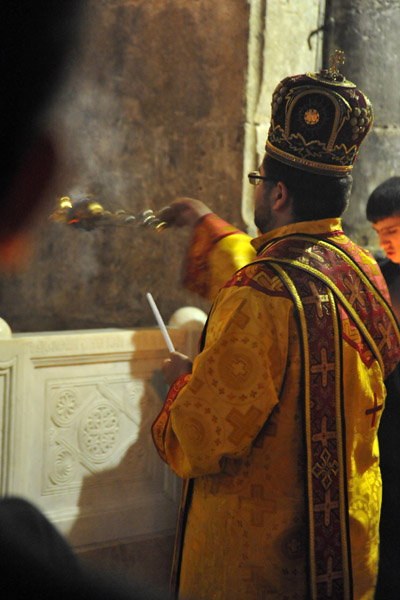 Orthodox priest spreading incense, Church of the Holy Sepulchre