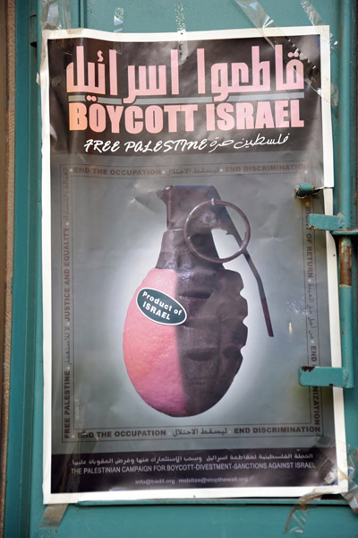 Boycott Israel poster with Israeli-grown orange as a hand grenade