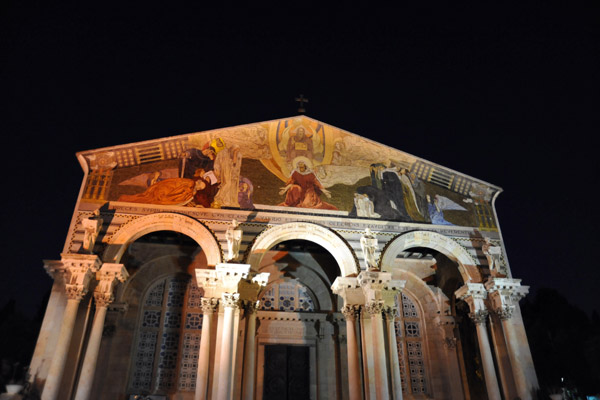 Western faade of the Church of All Nations at night