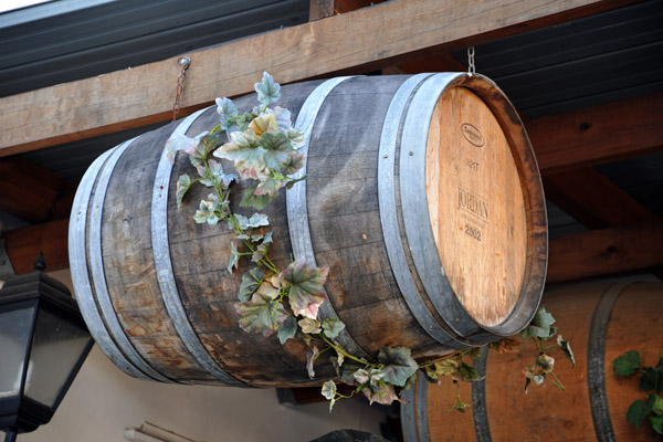 Wine cask hanging in front of the Dros
