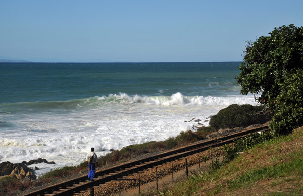 Man walking along the tracks, Mosselbaai