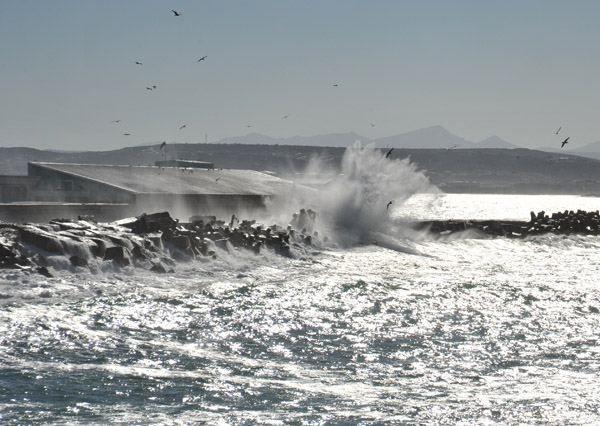 Waves pounding the break water of the Port of Mossel Bay