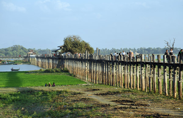 Amarapura's iconic U Bein's Bridge, a 1.2 km long teak footbridge over Lake Taungthaman