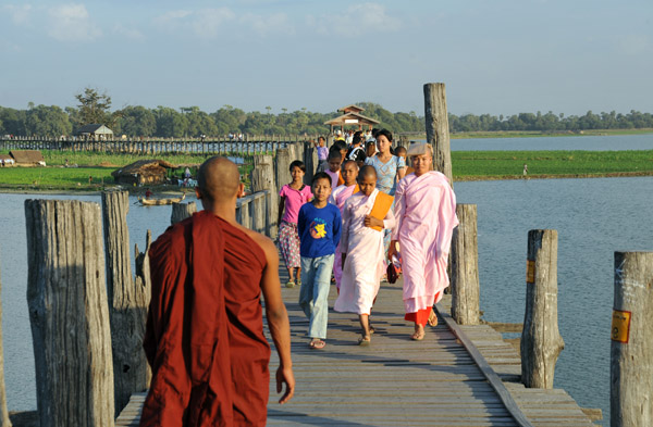 Monk crossing the Teak Bridge, Amarapura