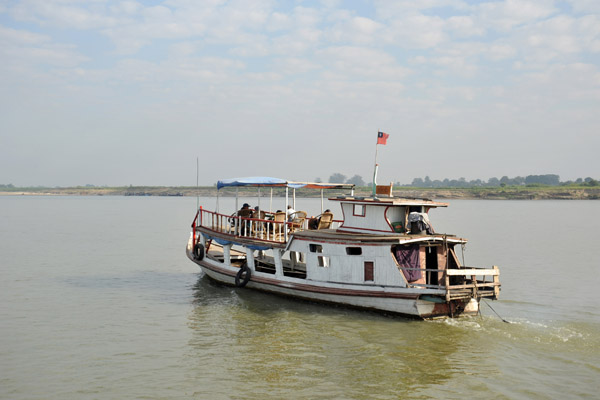 Boat ferrying tourists from Mandalay to Mingun, 8 km up the Irrawaddy River