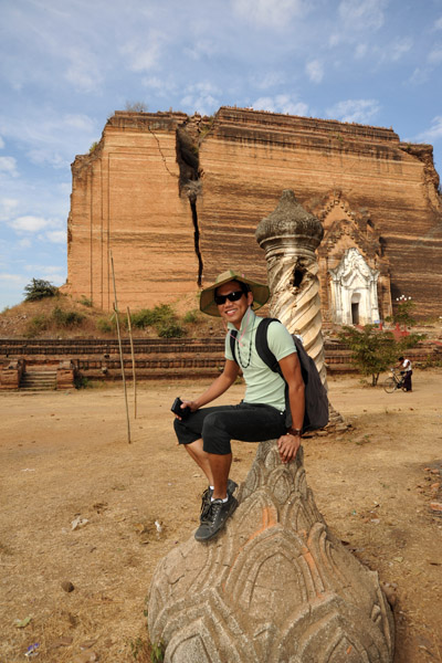 Sitting on a ruined capstone, Mingun Paya