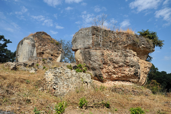 Ruins of the monumental guardian lions forming the gateway to Mingun Paya
