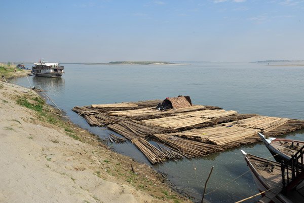 Bamboo raft pulled up along the banks of the Irrawaddy River at Mingun