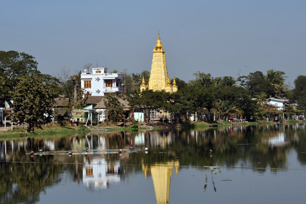 Golden pagoda on the Thinga Yarzar Canal from the Bayintnaung Road bridge, Mandalay