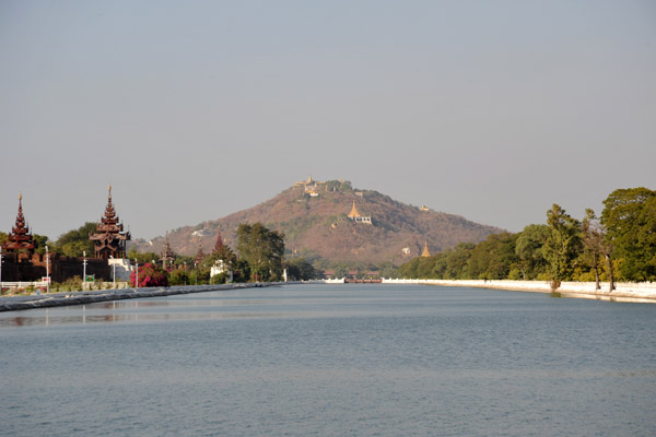 Eastern palace moat with Mandalay Hill