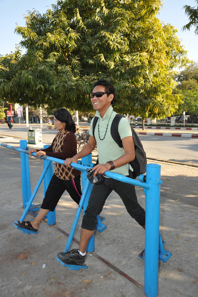 Exercise equipment along the palace moat