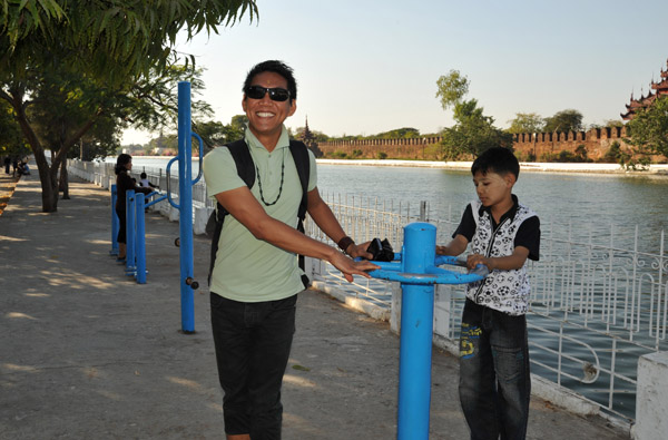 Exercise equipment along the moat of Mandalay Palace