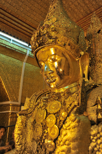 Gold encrusted Mahamuni Buddha in royal regalia