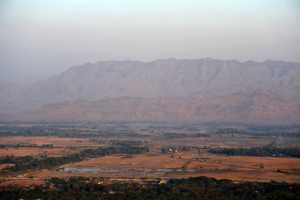 Mountains across the flat plain east of Mandalay