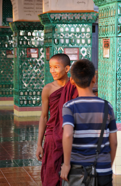 Young monk and a Burmese boy