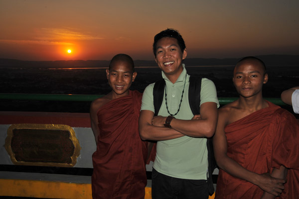 Dennis with monks on Mandalay Hill at sunset