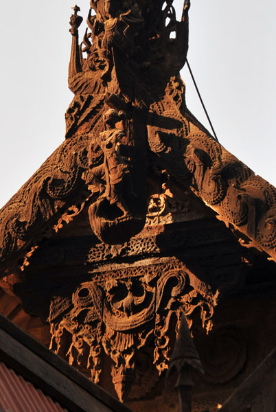 Detail of the intricate woodwork of the teak building