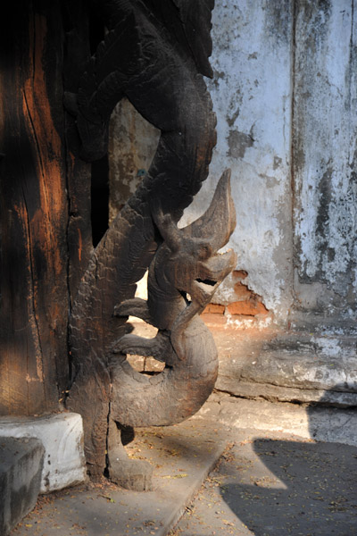 Teak carving of a naga serpent, Shwenanday Kyaung