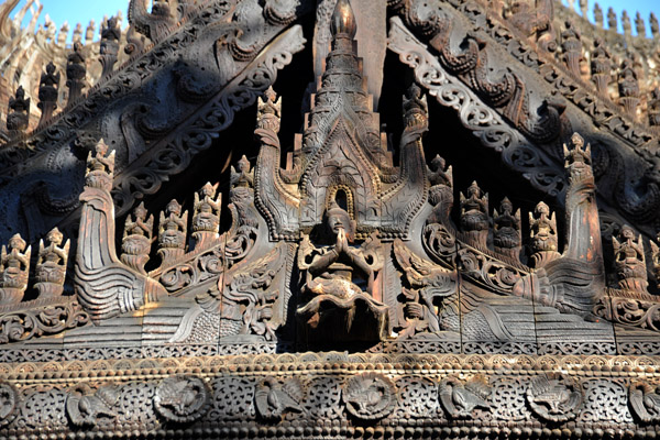 Detail of the carvings on one of the many gables, Shwenanday Kyaung Monastery, Mandalay